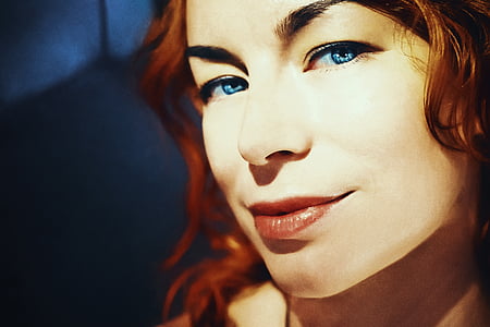 portrait photography of orange haired girl thumbnail