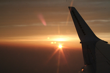 airplane during sunset thumbnail
