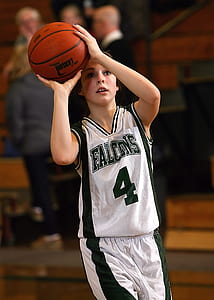 boy holding basketball thumbnail
