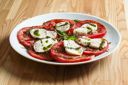 sliced tomato on plate thumbnail