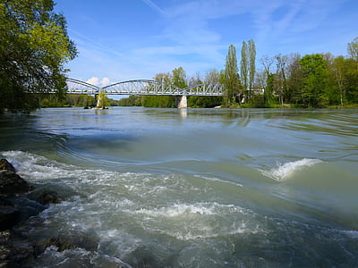 white metal bridge with body of water thumbnail