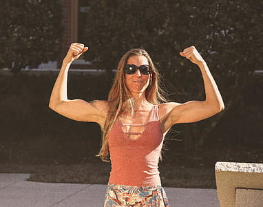 Woman in Brown Tank Top thumbnail