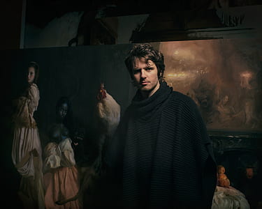 man wearing black scarf painting thumbnail