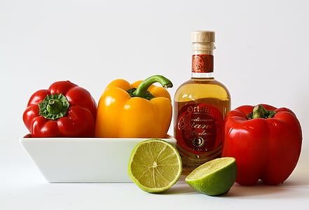 lemon beside red vegetable and glass bottle thumbnail