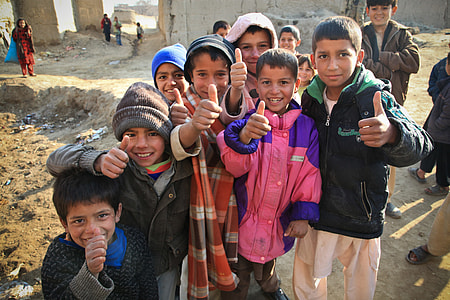group of people doing thumbs up during daytime photo thumbnail