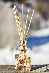 glass vase with wooden sticks thumbnail