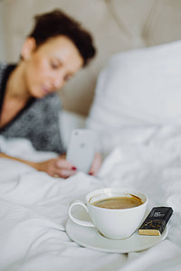 Morning coffee with chocolate in bed thumbnail