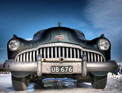 low angle photo of classic green vehicle thumbnail
