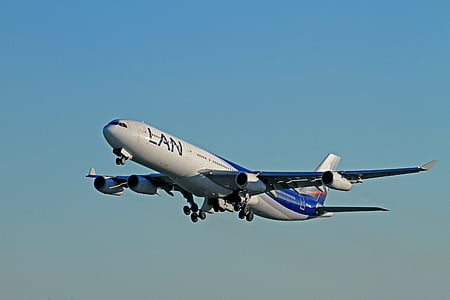 white and blue airliner thumbnail