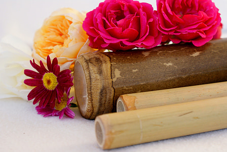 pink flowers on brown wooden tube thumbnail