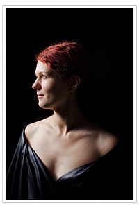 woman in black scoop-neck shirt thumbnail