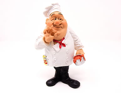 chef holding crab figurine thumbnail