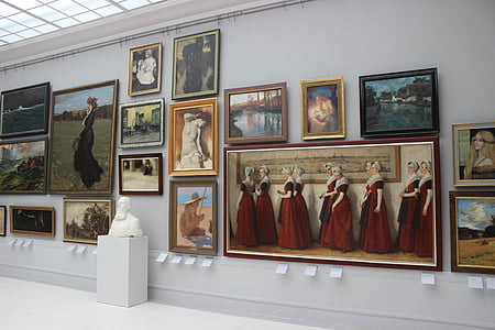 assorted painting mounted on wall thumbnail