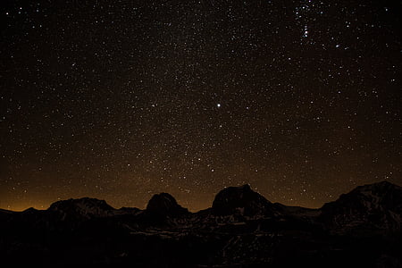 silhouette of boulder under star night thumbnail