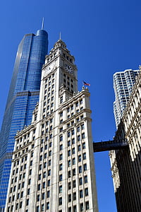beige concrete building with clock thumbnail