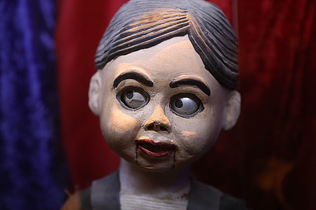 brown haired wooden puppet thumbnail