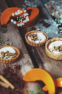 closeup photo of tart with cream on top thumbnail