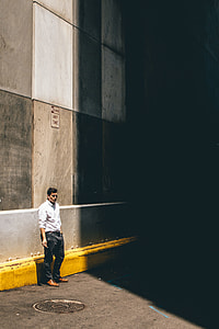 man in white dress shirt and black pants in the underground thumbnail