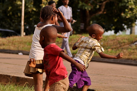 children plays on grass thumbnail