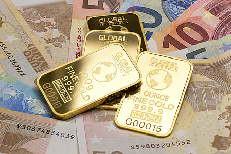 fine gold Global Intergold bars on banknotes thumbnail