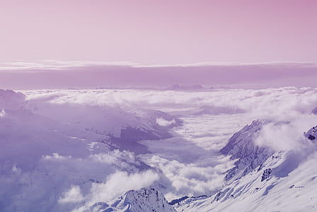 aerial photography of mountain alps with clouds thumbnail