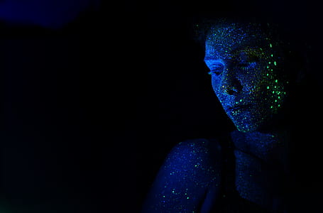 woman wearing black tank top with blue glitters thumbnail