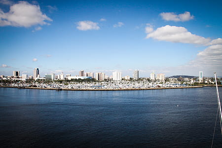 Body of Water With Buildings on Side thumbnail