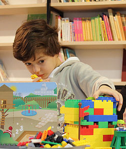 boy playing blocks toy thumbnail