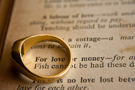 selective focus photography of gold-colored ring thumbnail