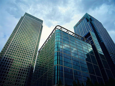 low-angle photography of building under white sky thumbnail
