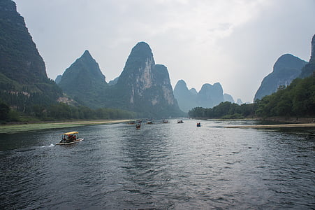 brown boat on body of water thumbnail