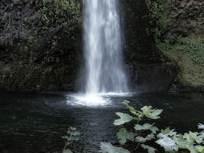 photo of waterfalls surrounded with rock thumbnail