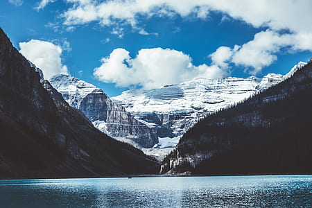 photography of lake and mountain range thumbnail