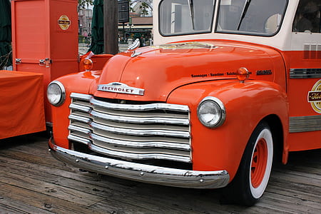 red Chevrolet C10 pickup truck thumbnail