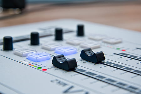 White Audio Mixer With Dial Turned Up thumbnail