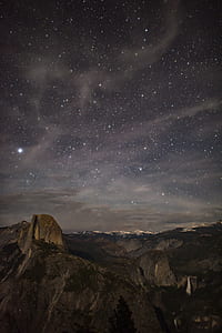 brown mountains during nighttime thumbnail