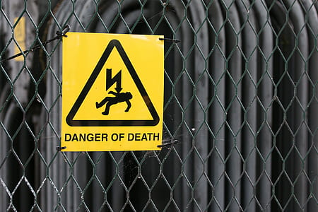 selective focus photography of Danger of Death electric shock signage thumbnail