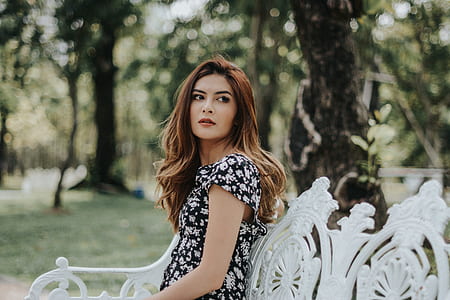 woman sitting on bench thumbnail