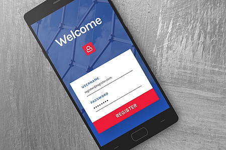 black Android smartphone with welcome register screen display on gray surface thumbnail