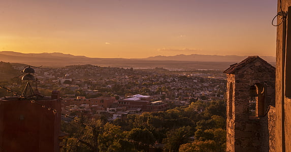 aerial view of house during sunset thumbnail