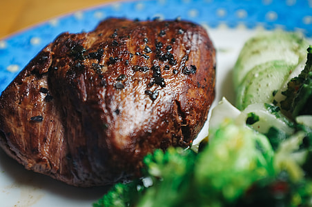 Beef steak with black salt close up thumbnail