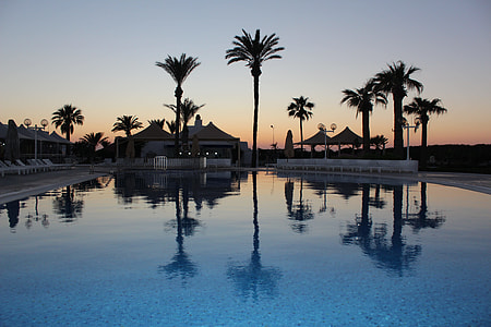 body of water during sunset thumbnail