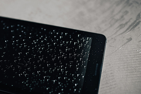 Wet black tablet thumbnail