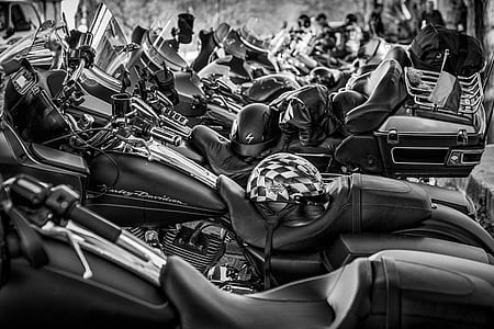 grayscale photography of motorcycle parked on street thumbnail