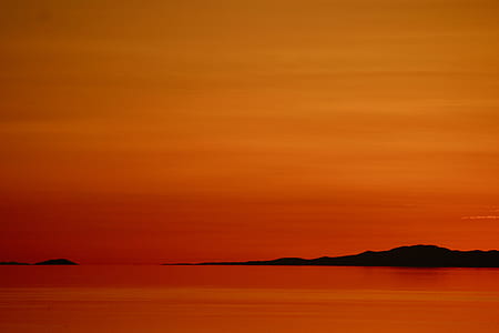silhouette photo of body of water thumbnail