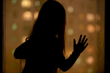 silhouette photography of long-haired girl thumbnail