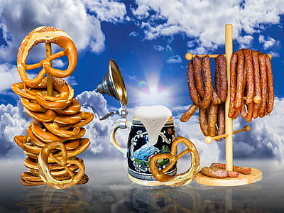 pretzels beside blue ceramic stein mug thumbnail