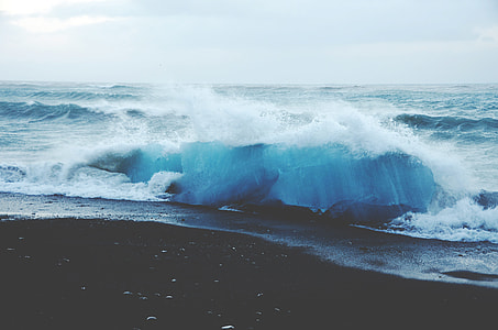 ocean waves during daytime thumbnail