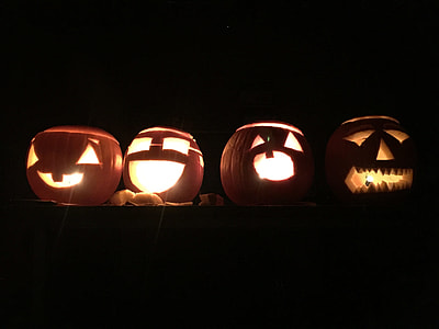 four orange jack-o-lantern table lamps on table thumbnail