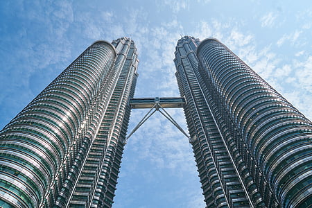 low angle photo of Petronas Tower, Malaysia under blue sky thumbnail